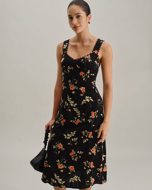 Zwart bloemenjurk met ruches en spaghetti bandjes in maxi-lengte
